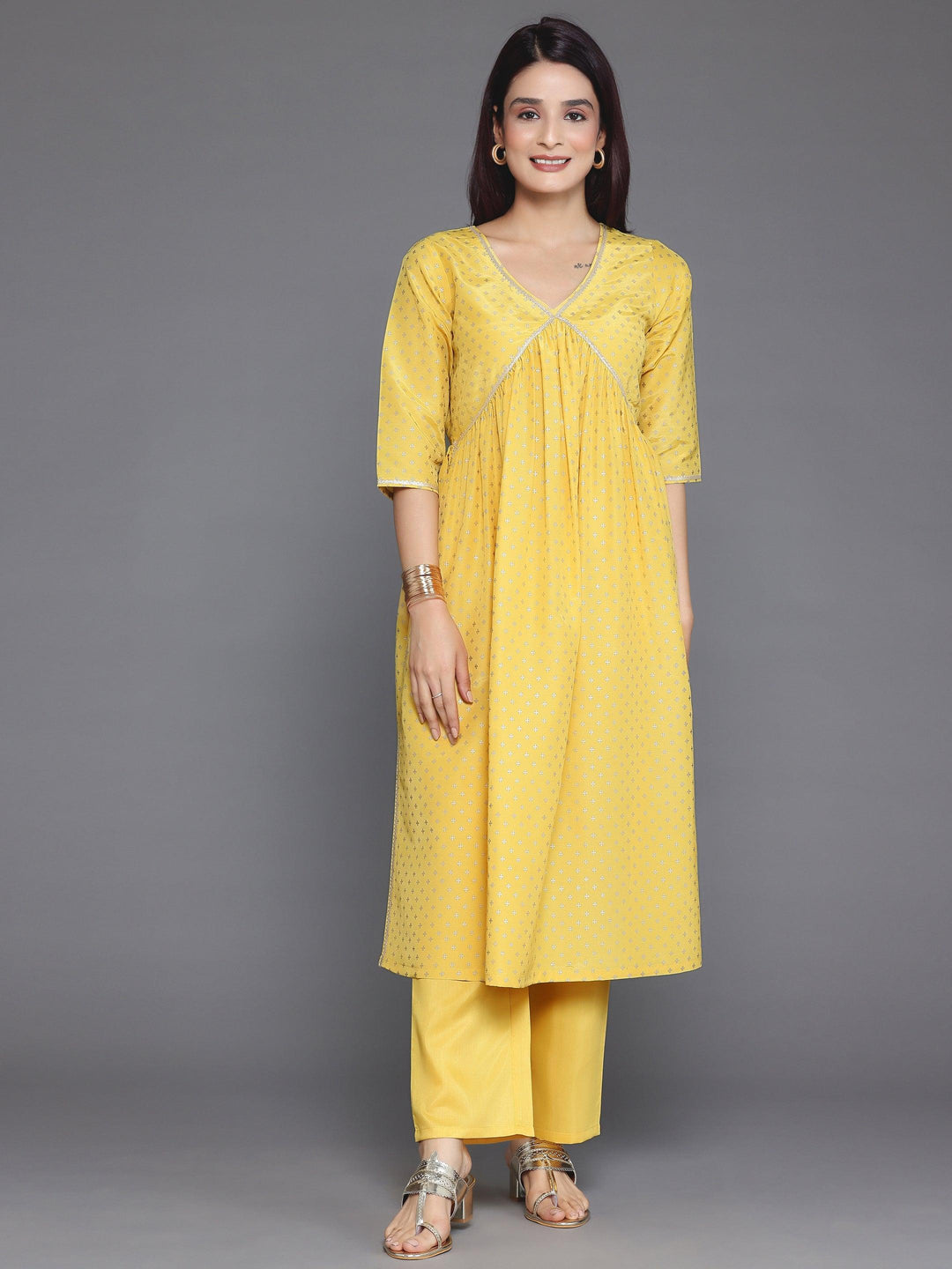 Yellow Woven Design Silk Blend A-Line Kurta With Trousers - Libas 