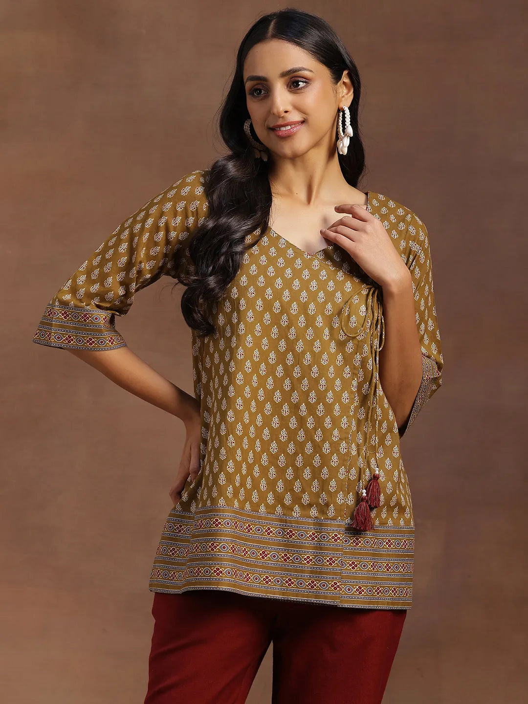 Mustard Printed Cotton A-line Kurti