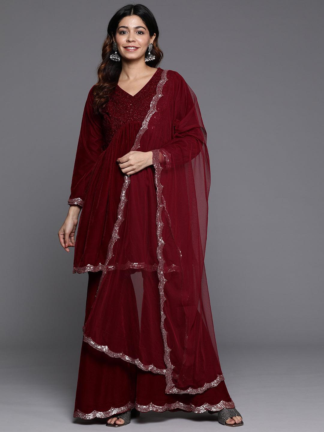 Maroon Embroidered Velvet A-Line Kurti With Sharara & Dupatta - Libas 