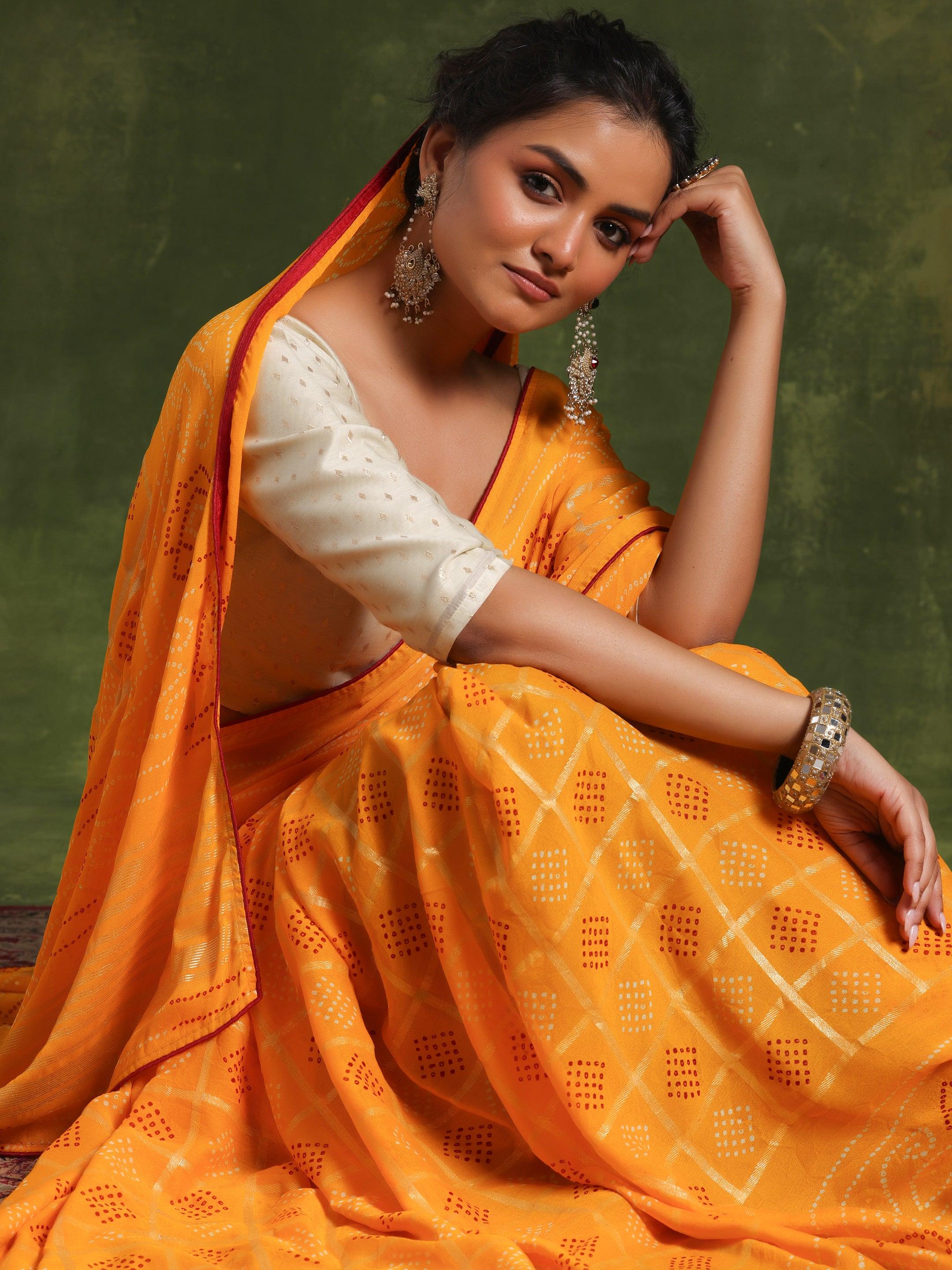 Mustard Printed Poly Georgette Saree With Unstitched Blouse Piece