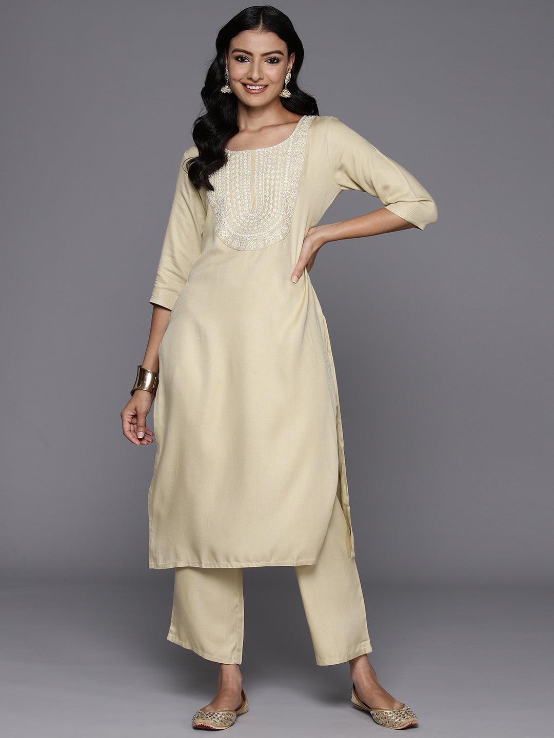 Beige Yoke Design Wool Blend Straight Kurta With Trousers - Libas 