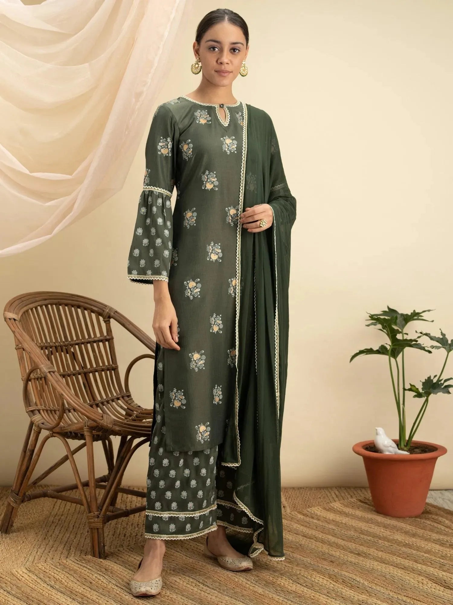 

Buy Green Printed Silk Straight Suit Set