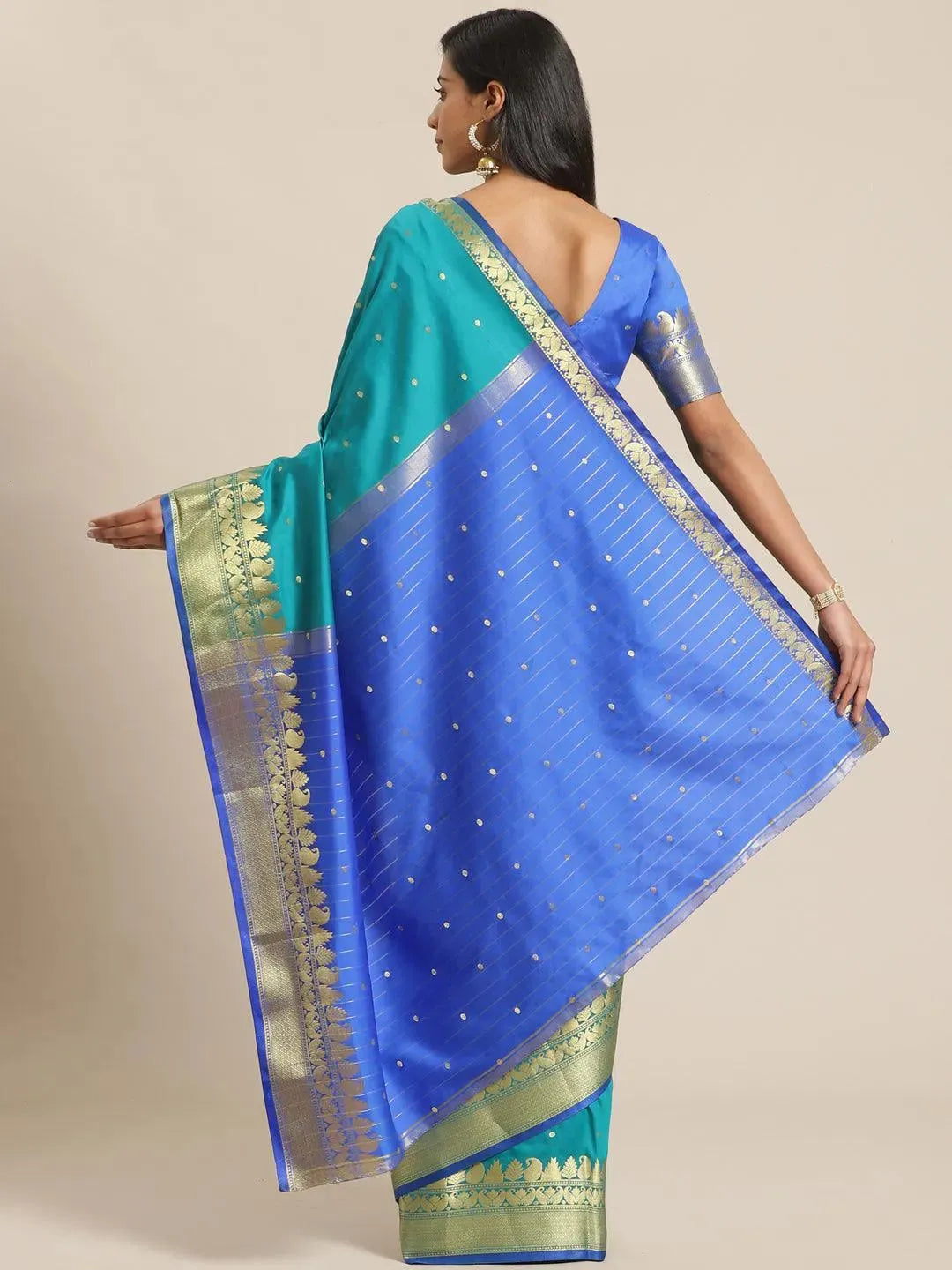 

Green Woven Design Silk Saree