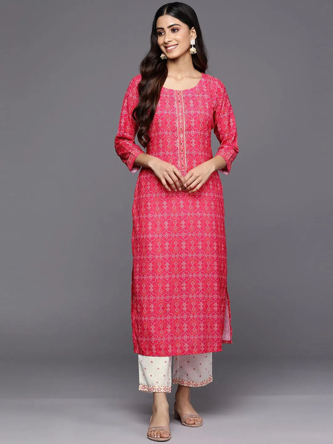 

Pink Printed Cotton Straight Kurta With Trousers