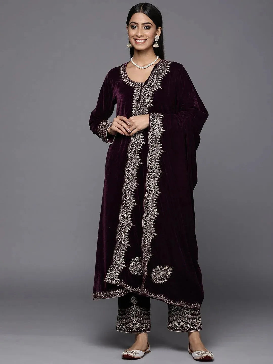 

Purple Embroidered Velvet A-Line Kurta With Trousers & Dupatta