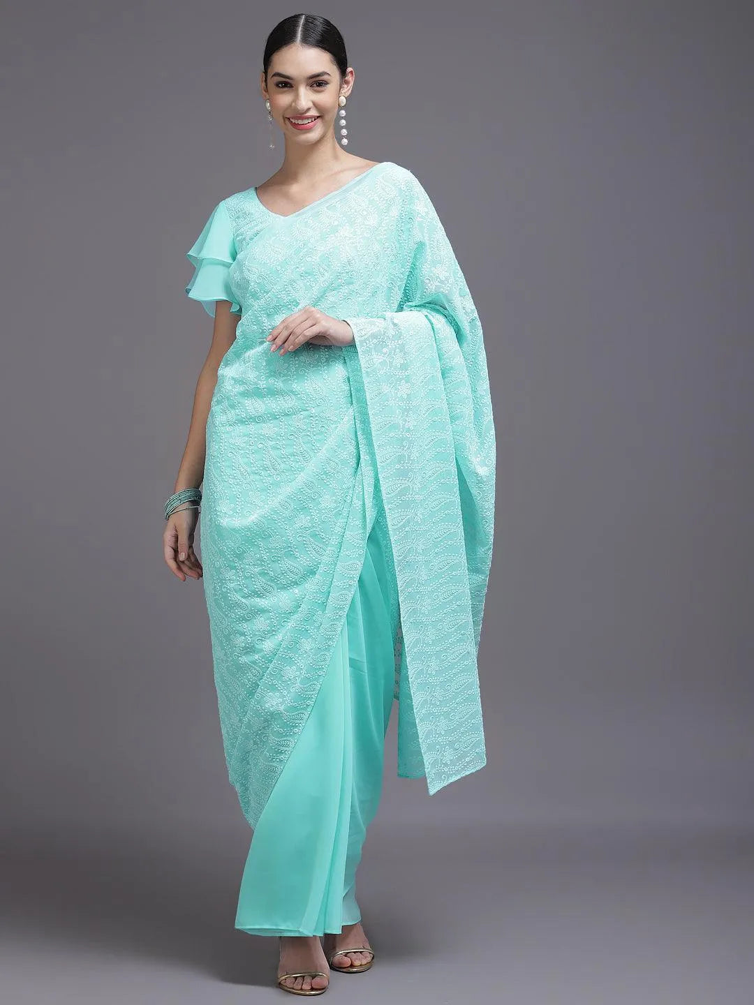 Turquoise Blue Embroidered Georgette Saree - Libas 