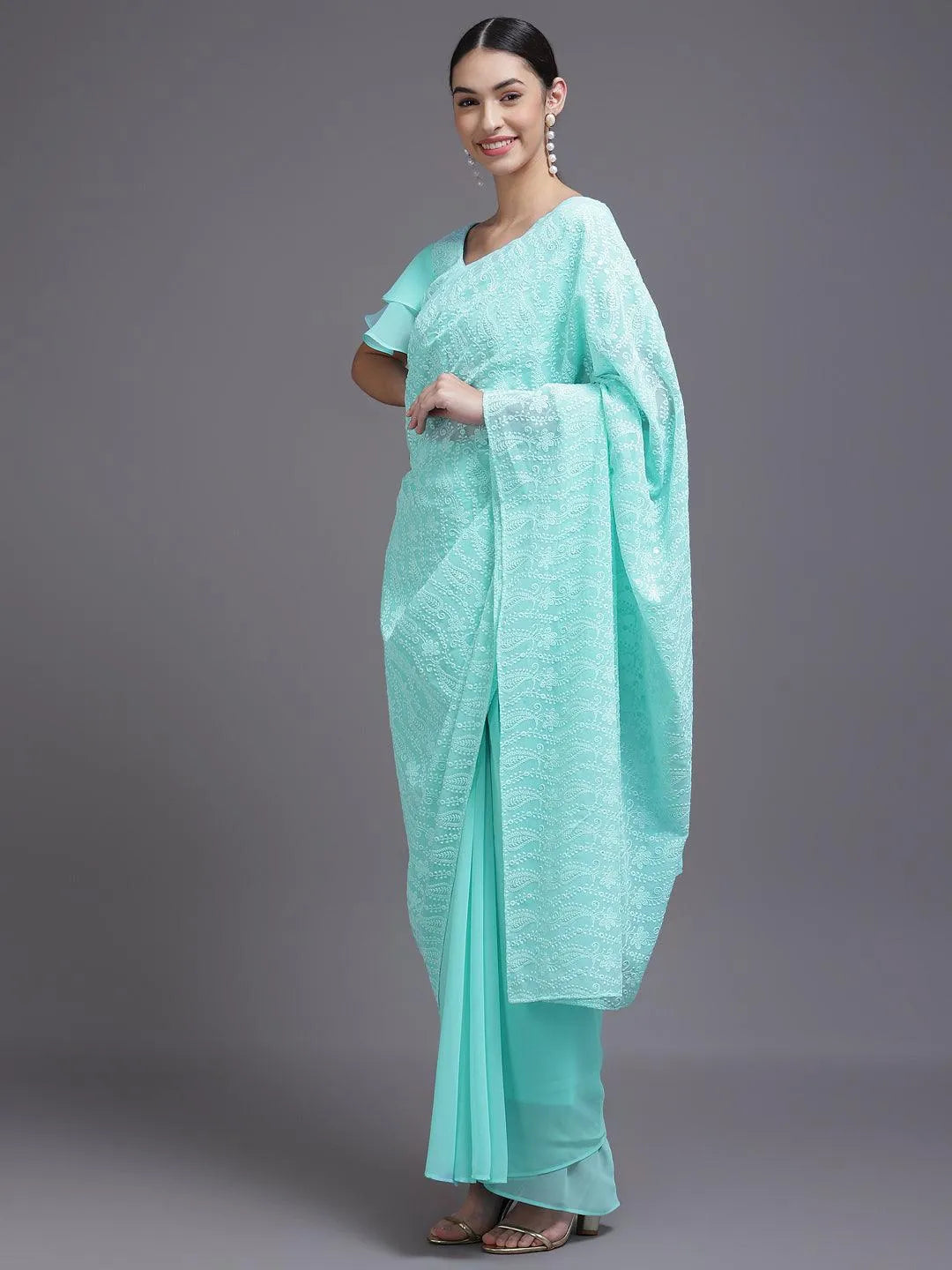 Turquoise Blue Embroidered Georgette Saree - Libas 