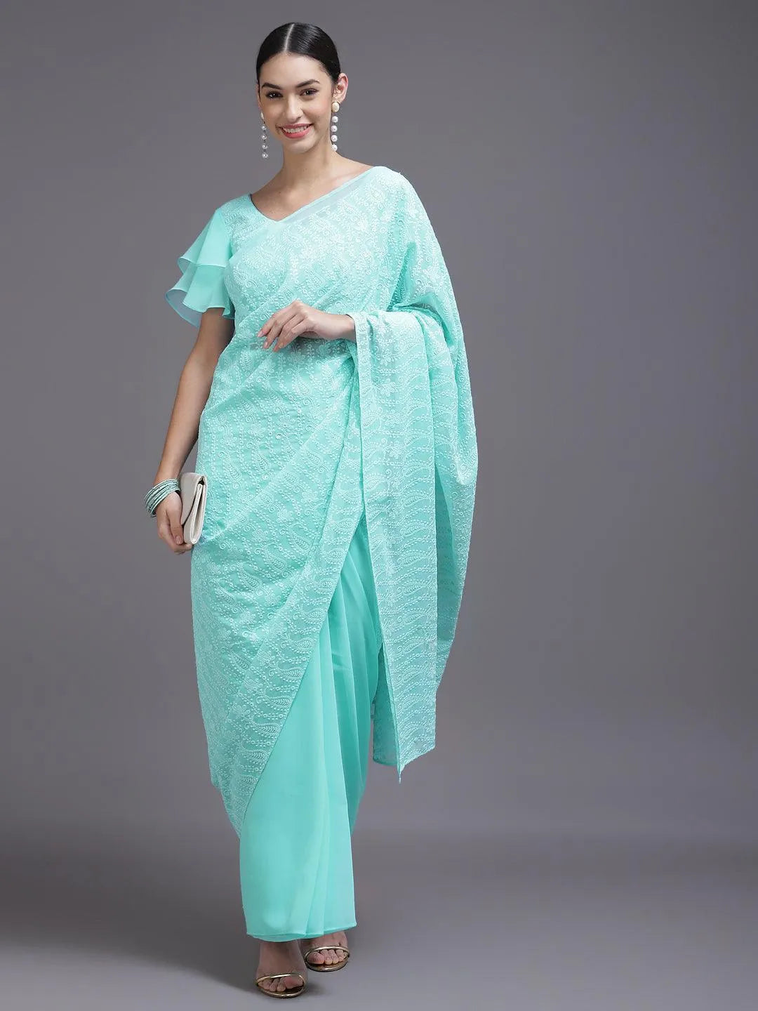 Turquoise Blue Embroidered Georgette Saree - Libas 