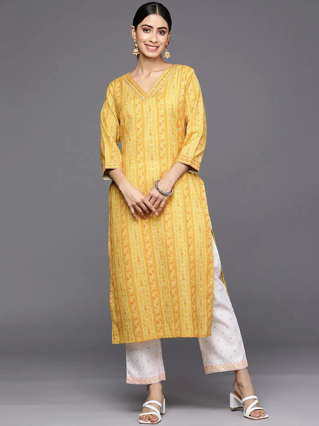 

Yellow Printed Cotton Straight Kurta With Trousers