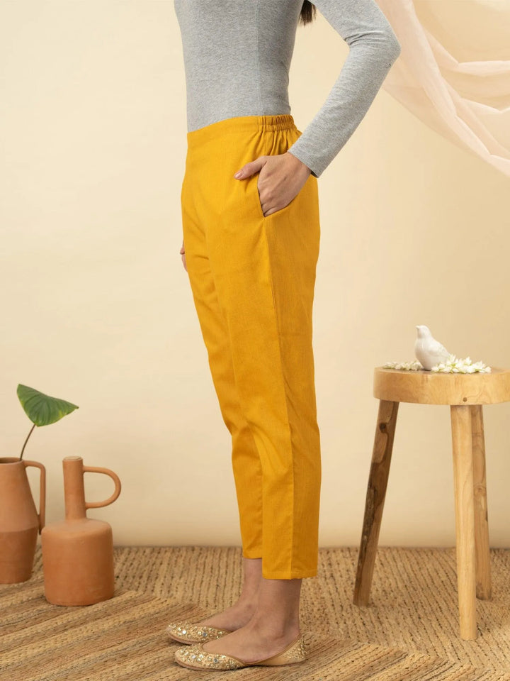 Yellow Solid Cotton Trousers - Libas