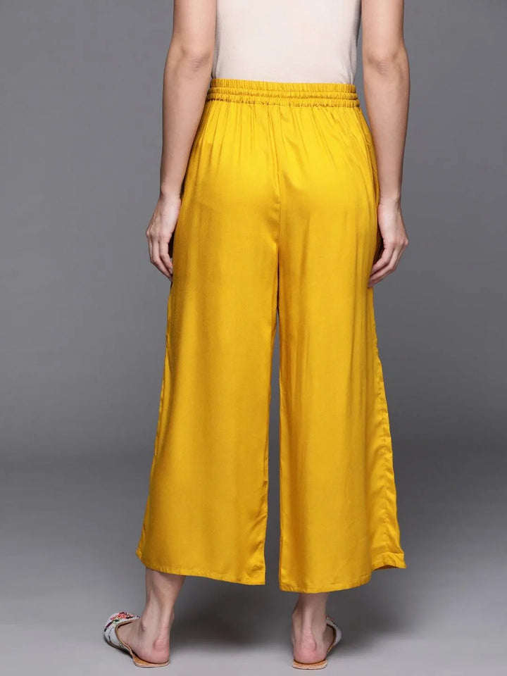 Yellow Solid Rayon Palazzos - Libas